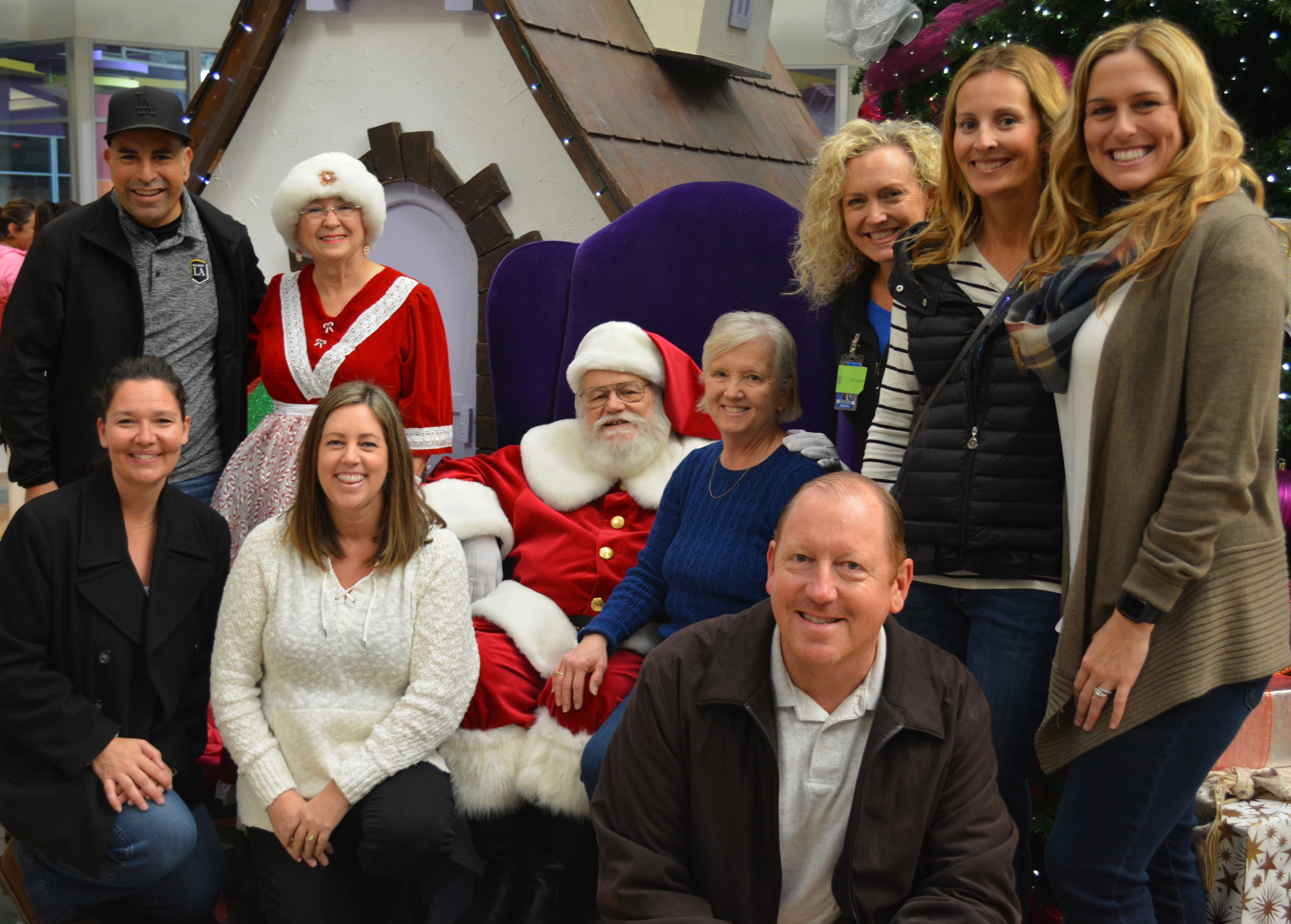 Orange Savanna's Administrators Visit with Santa at the Buena Park Shopping Spree. Diversity