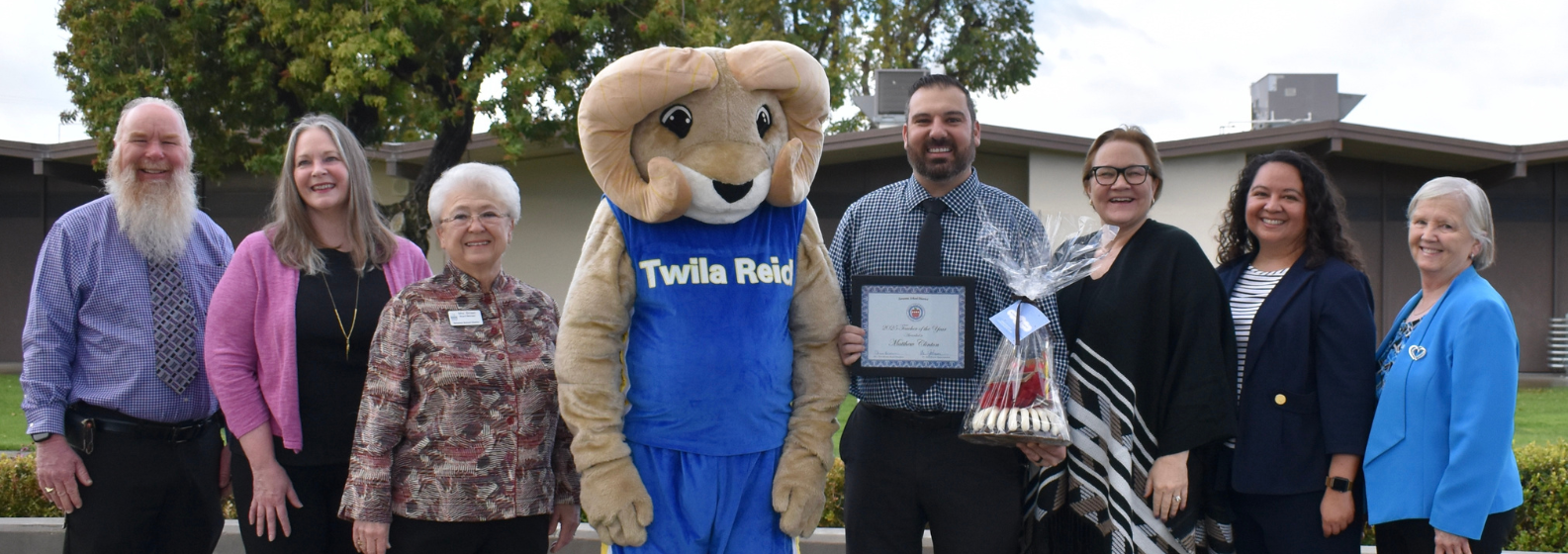 Principal Garcia, Board Members and Dr. Johnson, Mr. Clinton with Rammy